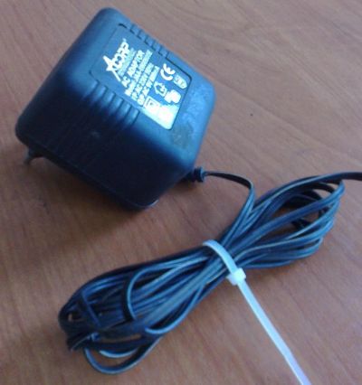 Лот: 4020239. Фото: 1. Блок питания ACORP 9V 800mA (model... Корпуса, блоки питания