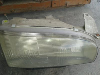 Лот: 11546893. Фото: 1. Toyota Sprinter AE100 Фара правая. Оптика и освещение