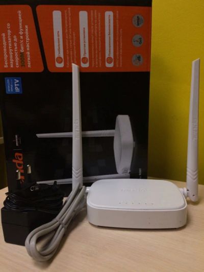 Лот: 9647999. Фото: 1. Продам Wi-Fi-роутер Tenda N301... Маршрутизаторы (роутеры)