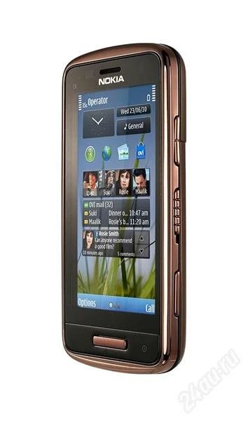 Лот: 2008745. Фото: 1. Nokia C6-01.3 Bronze brown. Состояние... Смартфоны