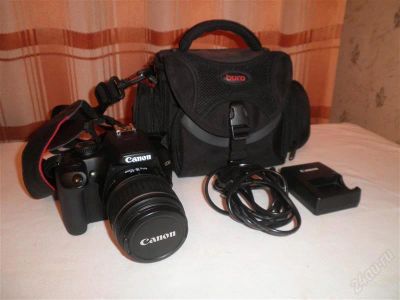 Лот: 1504117. Фото: 1. Canon 1000D Kit 18-55 (зарядное... Цифровые зеркальные