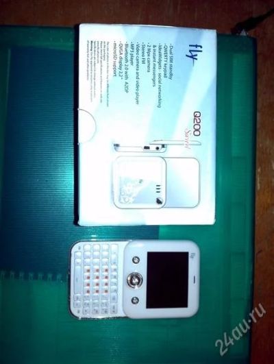 Лот: 1525752. Фото: 1. сотовый телефон Fly Q200 TV, WHITE... Кнопочные мобильные телефоны