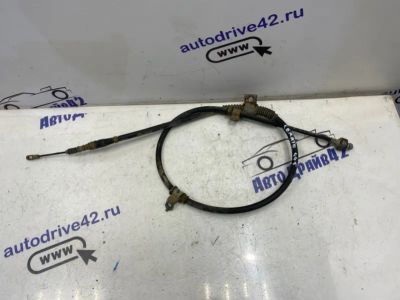Лот: 21715198. Фото: 1. тросик ручного тормоза Kia Cerato... Двигатель и элементы двигателя