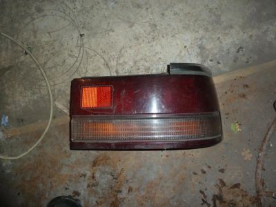 Лот: 4923817. Фото: 1. фонарь задний mazda capella 87-89... Оптика и освещение