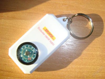 Лот: 1787079. Фото: 1. Компас-брелок от "DHL". Другое (туризм, охота, рыбалка, самооборона)