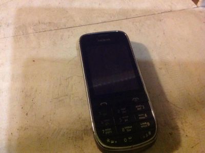 Лот: 8039450. Фото: 1. Сотовый телефон Nokia Asha 203. Кнопочные мобильные телефоны
