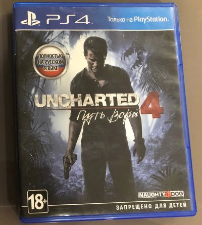 Лот: 12500103. Фото: 1. Uncharted 4 Путь Вора Игра для... Игры для консолей