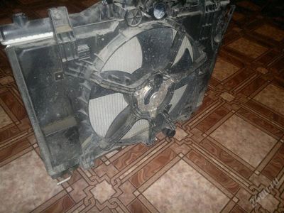 Лот: 2246442. Фото: 1. радиатор в сборе от nissan tiida... Двигатель и элементы двигателя