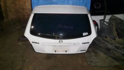 Лот: 18614031. Фото: 1. Задняя дверь багажника Mazda Familia... Кузов