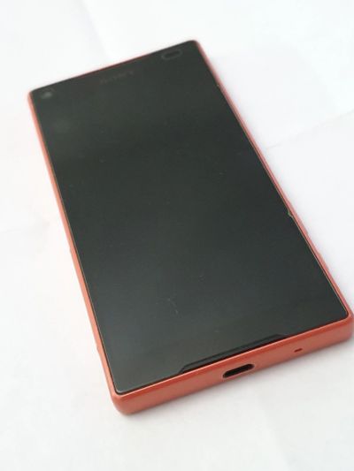 Лот: 15154465. Фото: 1. Sony Experia Z5 Compact коралловый... Смартфоны