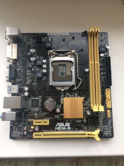 Лот: 10563388. Фото: 1. Asus H81M-R. Материнские платы