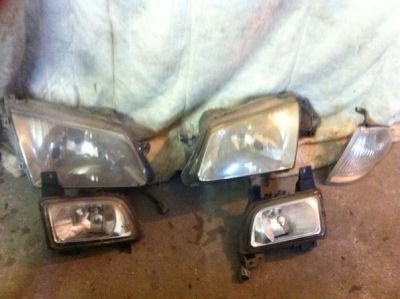 Лот: 7220317. Фото: 1. Туманка левая Mazda Familia 1999... Оптика и освещение