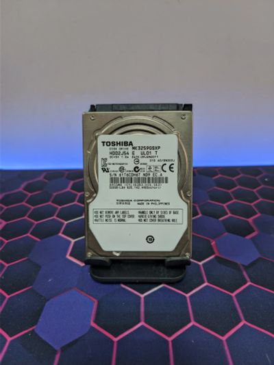 Лот: 25265104. Фото: 1. Жесткий диск 320Gb/2.5"/5400/Toshiba... Жёсткие диски (HDD)