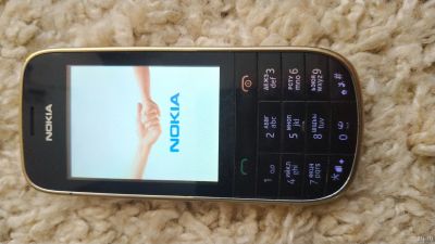 Лот: 14798642. Фото: 1. Сотовый телефон Nokia Asha 202... Кнопочные мобильные телефоны