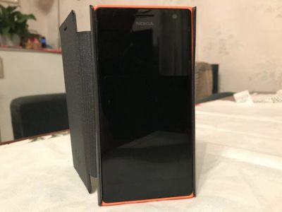 Лот: 10404339. Фото: 1. Смартфон Nokia Lumia 735 (оранжевый... Смартфоны