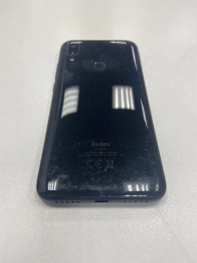 Лот: 19274999. Фото: 1. Xiaomi Redmi 7 2/16Gb Black 869541044839390. Смартфоны