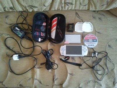 Лот: 1078016. Фото: 1. Серебристая PSP-2001 Slim (4Gb... Игровые приставки, консоли