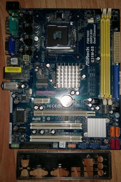 Лот: 14596824. Фото: 1. Материнская плата ASRock G31M-GS. Материнские платы