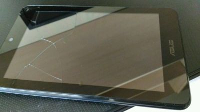 Лот: 10021239. Фото: 1. Планшет ASUS MeMO Pad HD 7 ME173X. Планшеты