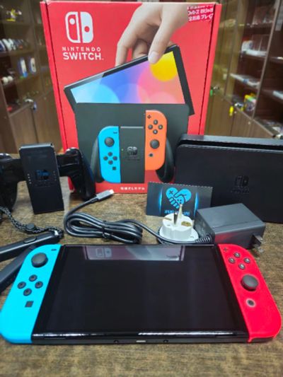 Лот: 21325940. Фото: 1. Nintendo Switch OLED 64gb Новая... Игровые приставки, консоли