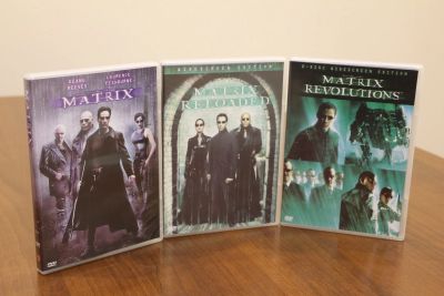 Лот: 19861350. Фото: 1. Трилогия "Матрица" на 3 DVD. Видеозаписи, фильмы