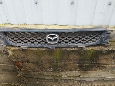 Лот: 23595920. Фото: 1. Решетка радиатора Mazda Capella. Кузов