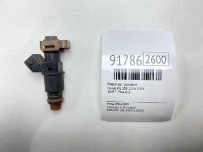 Лот: 23558930. Фото: 1. Форсунка топливная Honda Fit 2004... Топливная система