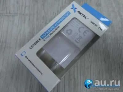 Лот: 13482195. Фото: 1. Сетевое ЗУ Axtel USB 2,1A белое. Зарядные устройства, блоки питания, адаптеры сетевые для смартфонов