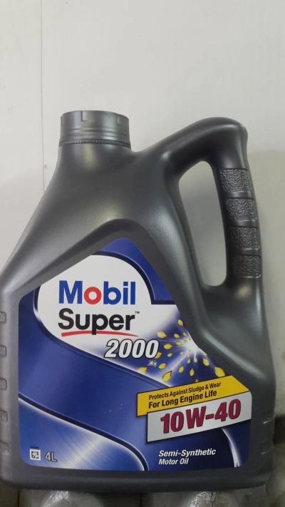 Лот: 10185548. Фото: 1. Mobil super 2000 10w40. Канистра... Масла, жидкости