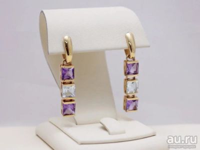 Лот: 12255334. Фото: 1. ЗОЛОТЫЕ СЕРЬГИ С АМЕТИСТОМ И ТОПАЗОМ... Серьги, каффы
