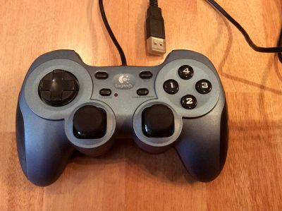 Лот: 4460756. Фото: 1. Джойстик Logitech RumblePad 2. Рули, джойстики