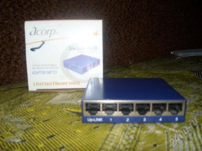 Лот: 597497. Фото: 1. Acorp 5 Port 10\100M Switch. Другое (сетевые устройства)