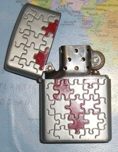 Лот: 6578750. Фото: 1. Зажигалка Пазлы. Сувенирные мелочи