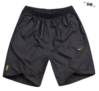 Лот: 4041031. Фото: 1. Шорты Nike с желтым логотипом. Брюки, джинсы, шорты