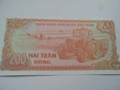 Лот: 6959970. Фото: 1. Вьетнам 200 донгов 1987, в обороте... Азия