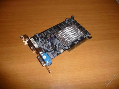 Лот: 1369070. Фото: 1. Видеокарта GeForce FX5200 AGP8X... Видеокарты