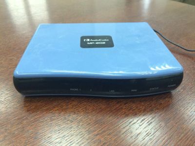Лот: 7739875. Фото: 1. Аналоговый телефонный адаптер... WiFi, Bluetooth адаптеры