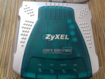 Лот: 1638130. Фото: 1. Модем ZyXEL OMNI 56K "NEO" новый. Проводные модемы