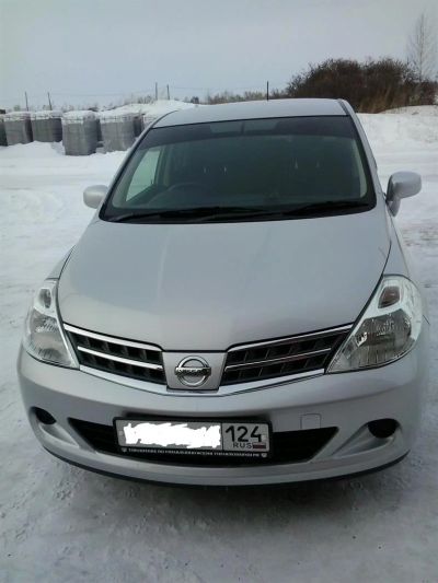 Лот: 3760078. Фото: 1. Продам Nissan Tiida 2010 год. Автомобили