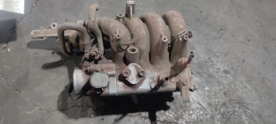 Лот: 25745945. Фото: 1. Коллектор впускной Suzuki Cultus. Двигатель и элементы двигателя