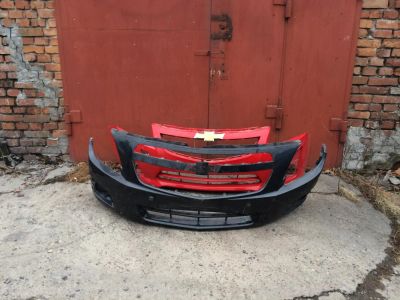 Лот: 4704033. Фото: 1. Chevrolet Orlando бампер передний... Кузов