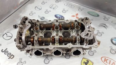 Лот: 23591280. Фото: 1. Головка блока цилиндров Nissan... Двигатель и элементы двигателя
