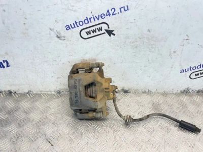 Лот: 25558549. Фото: 1. суппорт тормозной Opel Astra J. Тормозная система