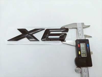 Лот: 25391126. Фото: 1. Шильдик с клеевой основой X6 черный... Детали тюнинга
