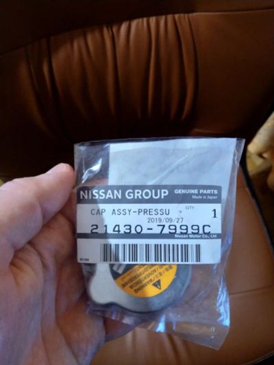 Лот: 17155648. Фото: 1. Крышка радиатора Nissan 214307999C. Двигатель и элементы двигателя
