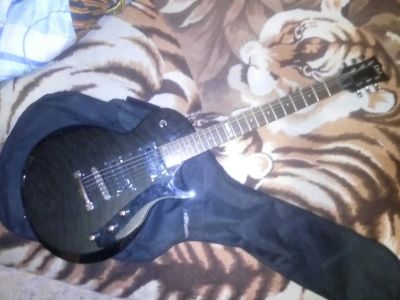 Лот: 9346599. Фото: 1. Электрогитара ESP LTD EC-100QM. Гитары