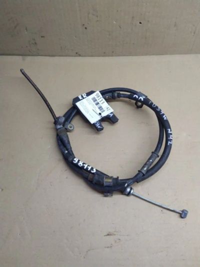 Лот: 21397722. Фото: 1. трос ручника Suzuki Escudo TD54W. Другое (автозапчасти)