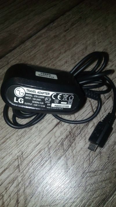 Лот: 12274607. Фото: 1. Зарядное LG STA-U35RR 4.8V 400mA. Зарядные устройства, блоки питания, адаптеры сетевые для смартфонов