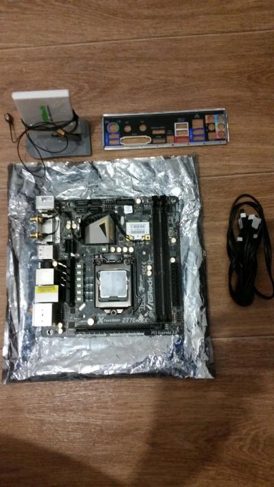 Лот: 7975996. Фото: 1. Материнская плата ASRock Z77E-ITX. Материнские платы