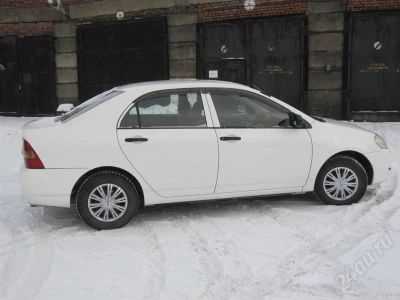 Лот: 676810. Фото: 1. продам Тойота Corolla 2002 белая... Автомобили